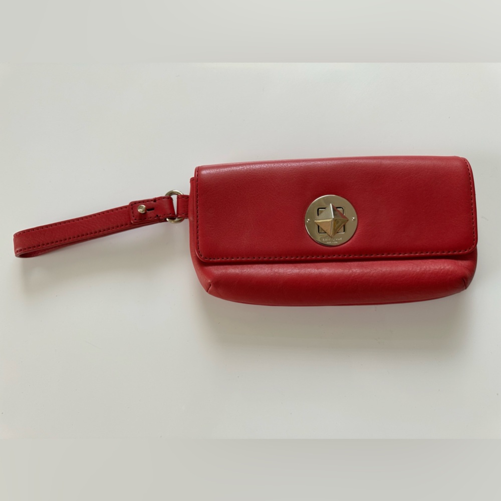 Kate Spade Red leather wristlet purse. Excellent condition.